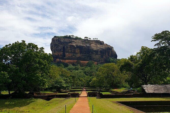 Day Trips from Kandy to Sigiriya with Village Experiences - Sigiriya Rock Fortress: Lion Rock and the ticket you must plan for